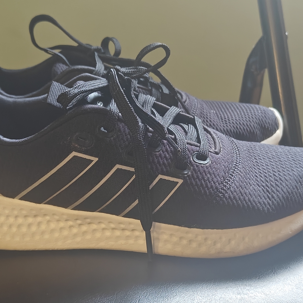 Adidas Black and White Sneakers with Breathable Mesh and Sleek Design